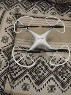Explorer's Drone white colour and camera with box and paper