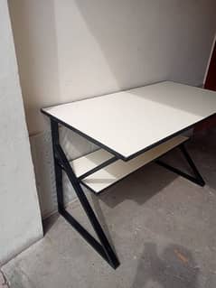 computer table 2ft*4ft. . double top. . lamination with PVC fitting.