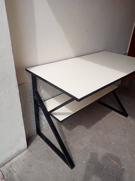 computer table 2ft*4ft. . double top. . lamination with PVC fitting. 0