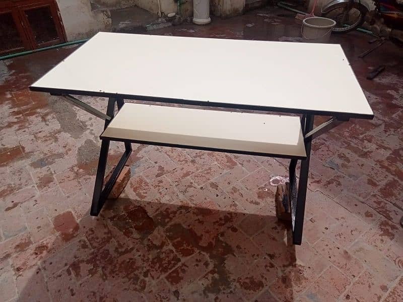 computer table 2ft*4ft. . double top. . lamination with PVC fitting. 2