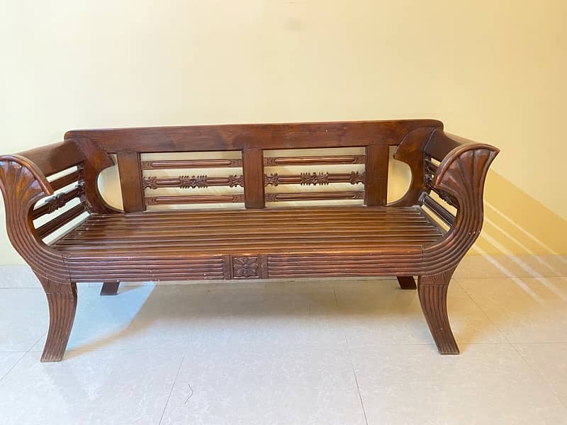 2 seater wooden sofa with cushions for sale 2