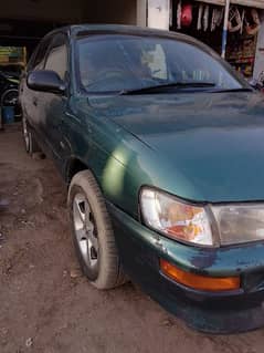 Indus Corolla green color ha 1.6 automatic transmission good condition 0