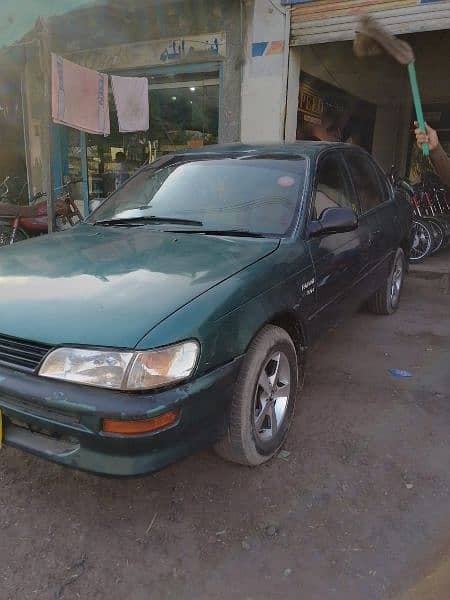 Indus Corolla green color ha 1.6 automatic transmission good condition 2