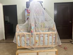 swing with mosquito net with 2 matresses hanging toys nd pillows