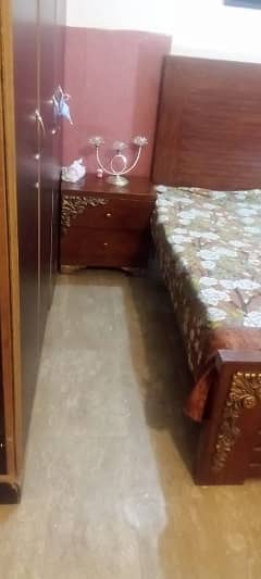 bed with matters and wood table best condition