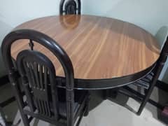 dining table with 6 chairs very less used . new condition 0