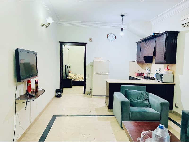 F-11 Markaz 1 Bed 1 Bath with Tv Lounge Kitchen Car Parking Available for Rent 1
