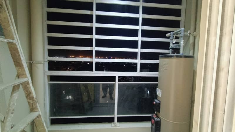 2 BED DRAWING DINNING BRAND NEW FLAT FOR SALE IN JAUHAR BLOCK 7 ISRA TOWER 8