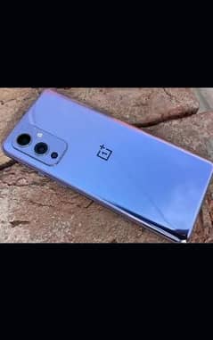OnePlus 9 12/256 with 65 volt charger