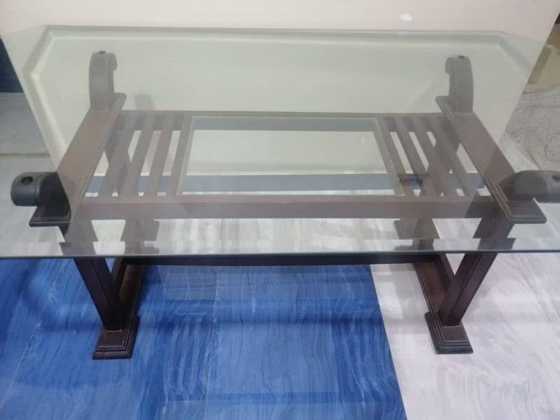 Dining table without chairs , Glass top Wooden base A1 condition 1