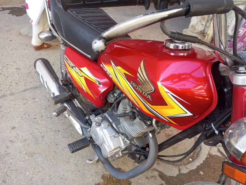Honda 125 model 2021 2 owner Karachi number 03303718656 3