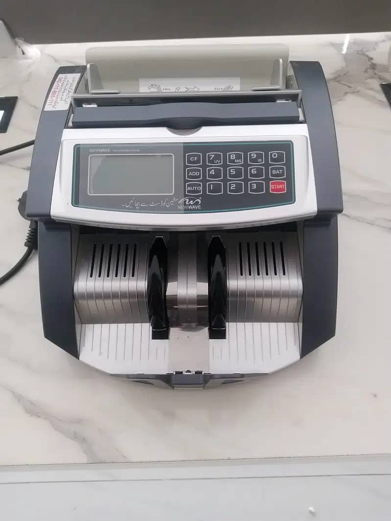 NEWWAVE MODERN SOLUTIONS CASH COUNTING MACHINE 0