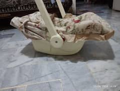 slightly used carry cot. . . just few months used
