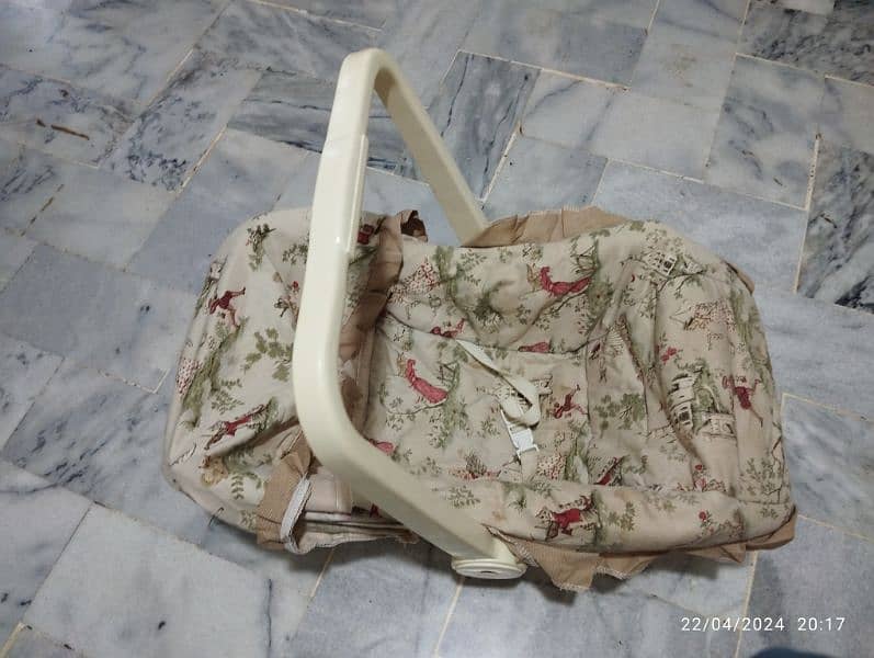 slightly used carry cot. . . just few months used 1