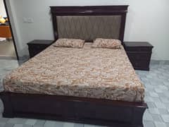 King size bed with 2 side tables and dressing table