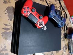 playstation 4 1tb with controllers and game cd's