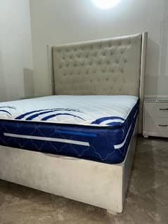 Well conditioned Queen size bed along side tables and Mirror