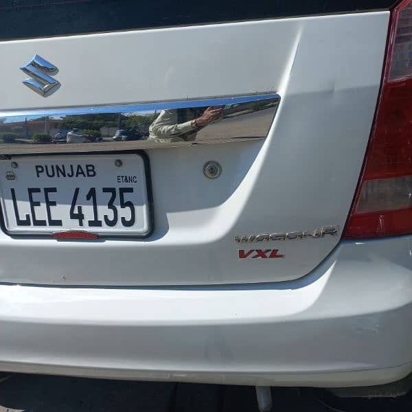 Wagon R VXL ,سفید کلر  لاہور نمبر گڈ کنڈیشن نان ایکسیڈنٹ  AC چالو 5