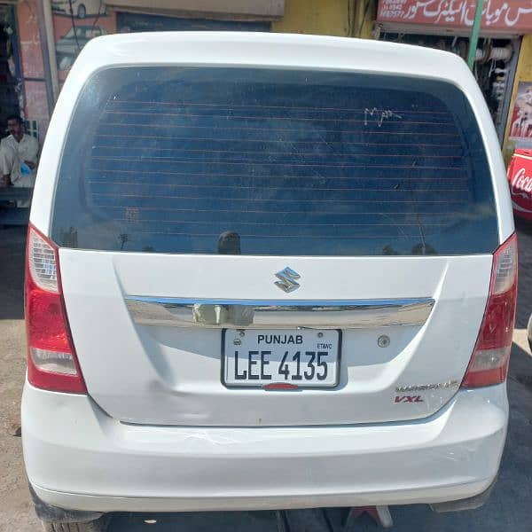 Wagon R VXL ,سفید کلر  لاہور نمبر گڈ کنڈیشن نان ایکسیڈنٹ  AC چالو 6