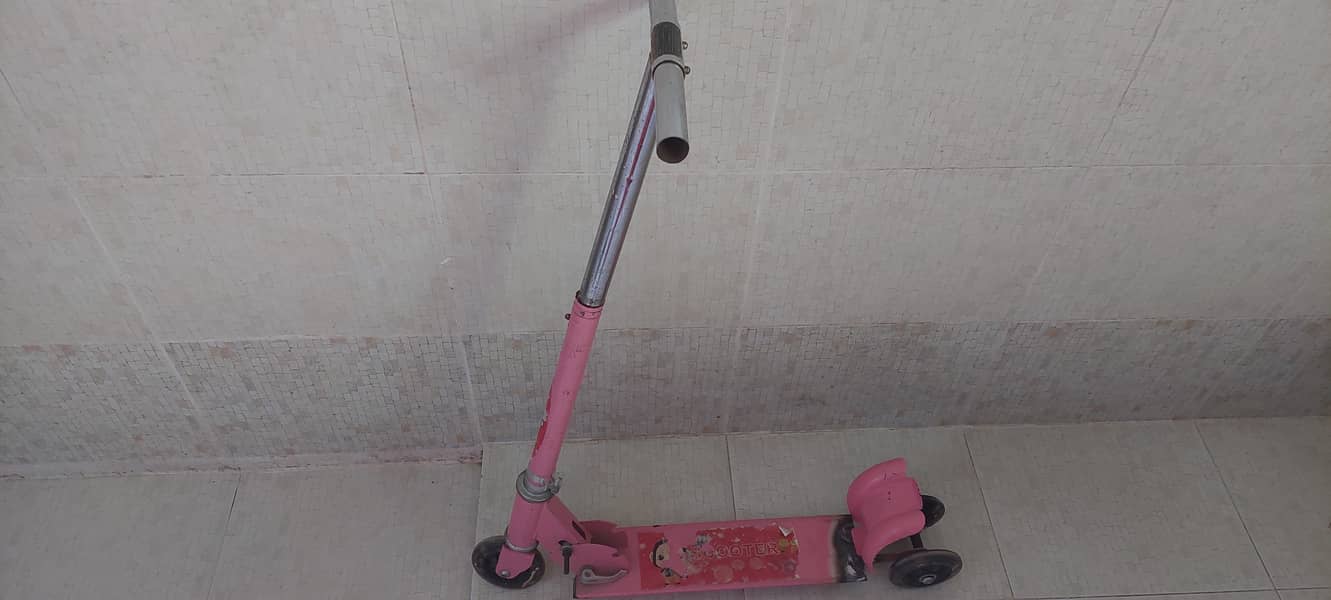 Pink colour kids scooty 1