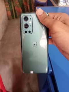 ONE PLUS 9PRO green color android 14 global. dual 0/3/7/0/8/5/9/7/1/1