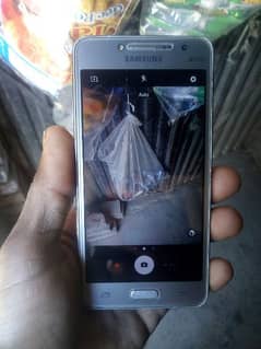 Samsung Grand prime Plus.   2GB.   8GB.   PTA proof hai  4G  spotted