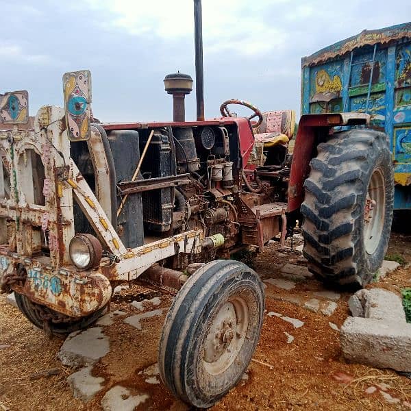 MF 385 tractor and tralla for sale model 2006 2