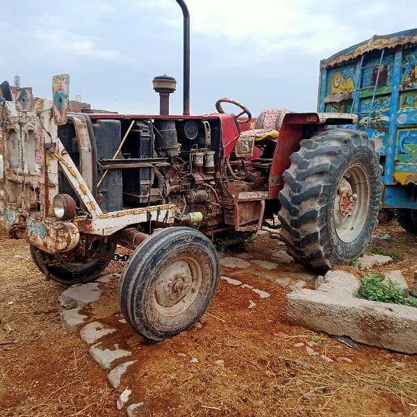 MF 385 tractor and tralla for sale model 2006 3