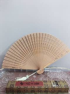 Sandalwood Chinese folding fan 0
