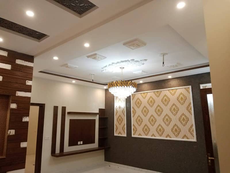 10 Marla Brand New 1st Entry House is for rent in wapda Town. 4