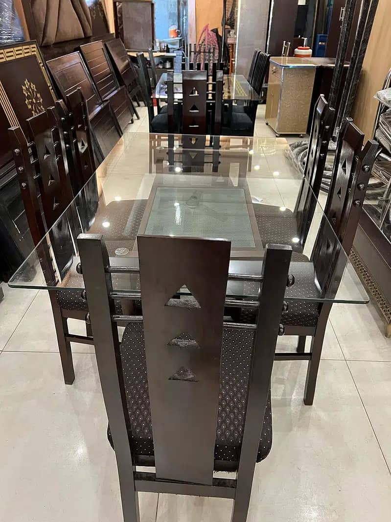 Dinning table/wooden table/7 seater dinning table/Chairs/top glass 9