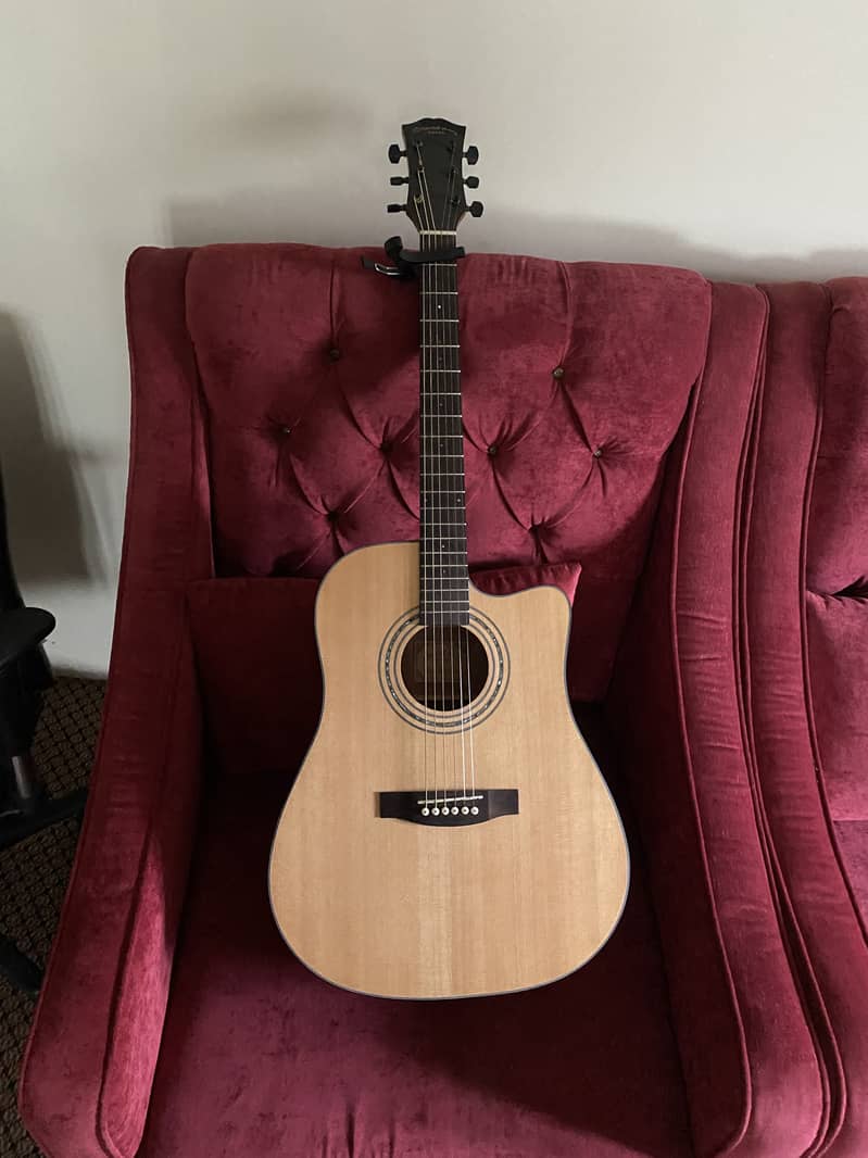selling my Oriental cherry accoustic Guitar 0