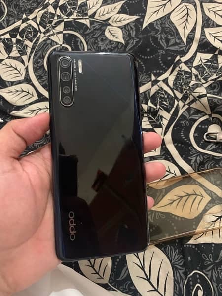 oppo f15 with complete box charger 10/10 condition 128gb amoled disp 0