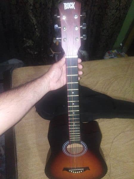 I am selling my guitar in mint candition with bag 0