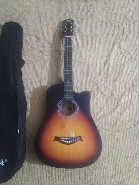 I am selling my guitar in mint candition with bag 3