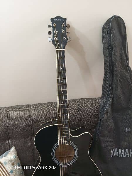 Black Guitar with bag,capo and pick 2