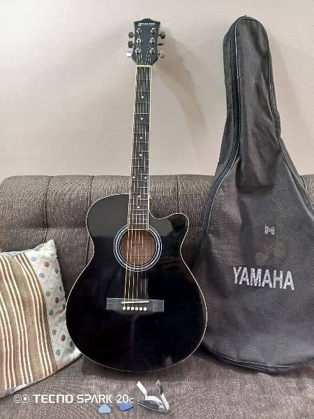 Black Guitar with bag,capo and pick 7