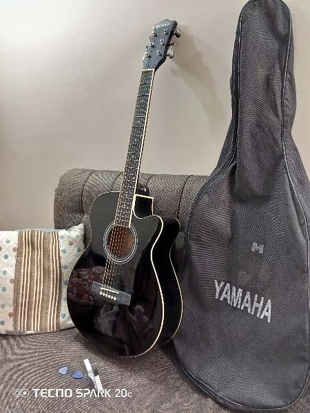 Black Guitar with bag,capo and pick 8