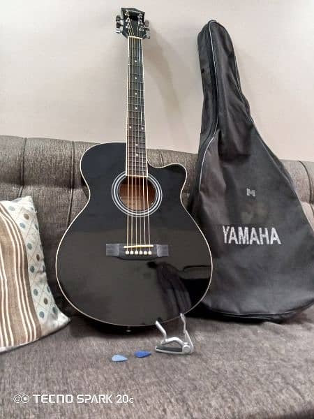 Black Guitar with bag,capo and pick 9