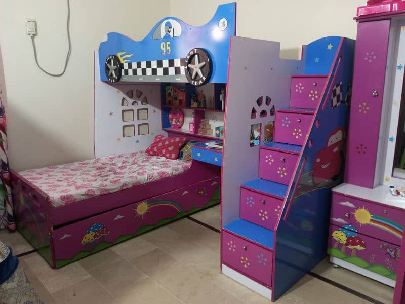 Bunk bed with a sliding bed. 0