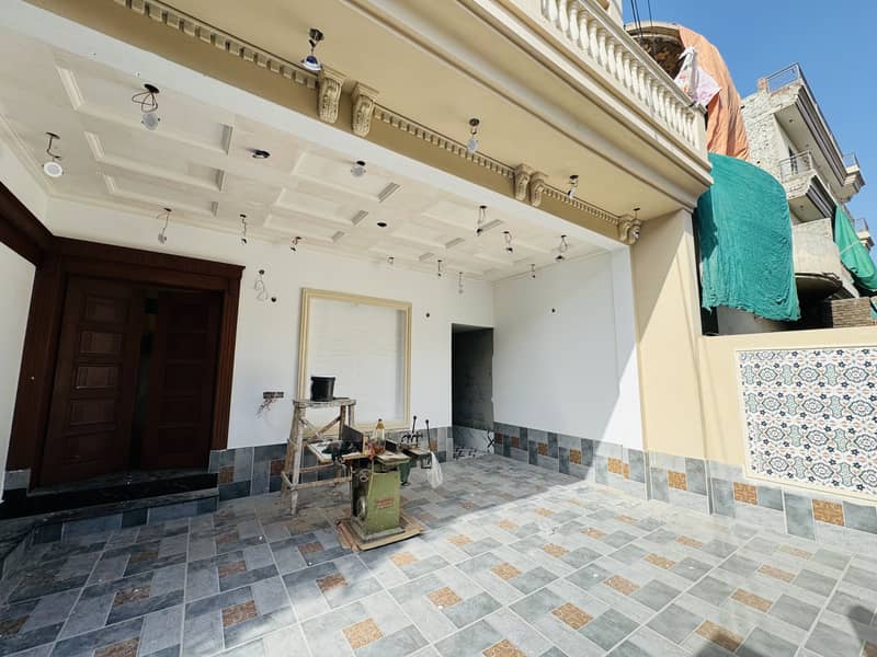 BRAND NEW SPAINISH HOUSE PRIME LOCATION 10 MARLA HOUSE IS AVAILABLE FOR SALE IN GOOD LOOKING 4