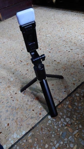 Bluetooth tripod for sell 1