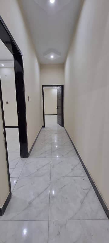 Portion available in North nazimabad Block R 2 bed DD Guard in street 100 yards 2
