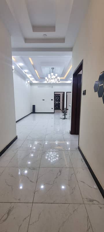 Portion available for sale in North Nizamabad block C 220 yards Project with lift and basement parking 23