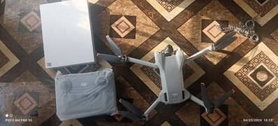 Dji mini 3 almost new flown once with 1 year warranty and 128gb SD