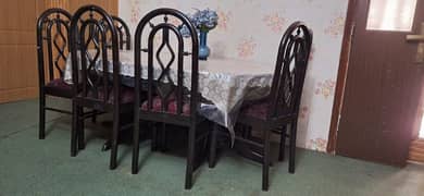 Black dining table with 6 chairs