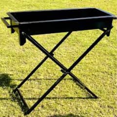 barbeque with foldable. stand