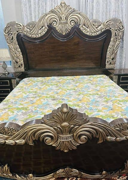 Royal style wooden bed set includes bed, side table, dressing table. 3
