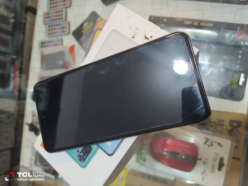 redmi note 10 with full box charger 10 by 10 condition 1