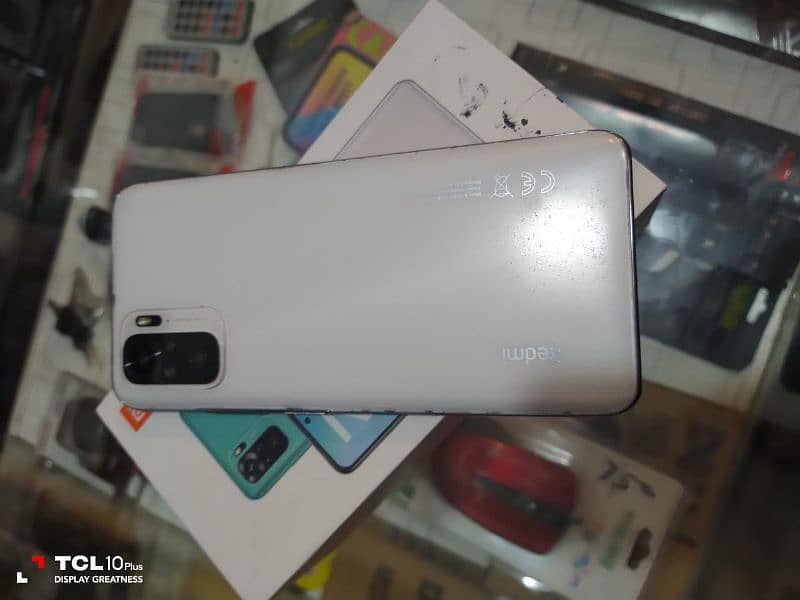 redmi note 10 with full box charger 10 by 10 condition 2
